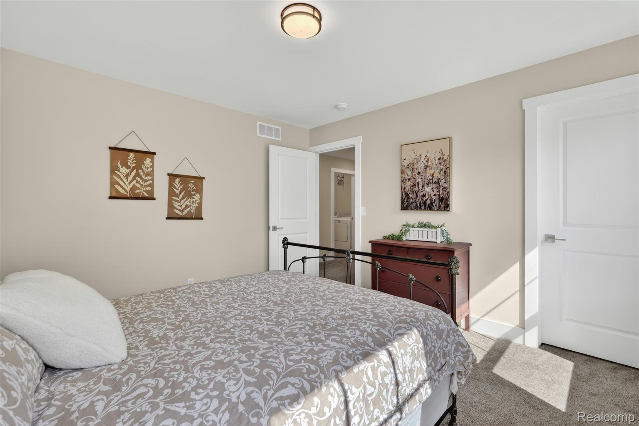 8130 Hinchey Road Pinckney, MI 48169 - Photo 21 of 62 Carpeted bedroom with baseboards