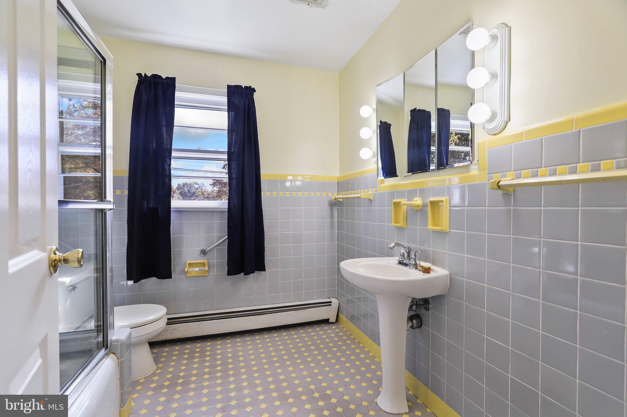120 West Upper Ferry Road Ewing, NJ 08628 - Photo 20 of 27 a bathroom with a sink toilet and mirror