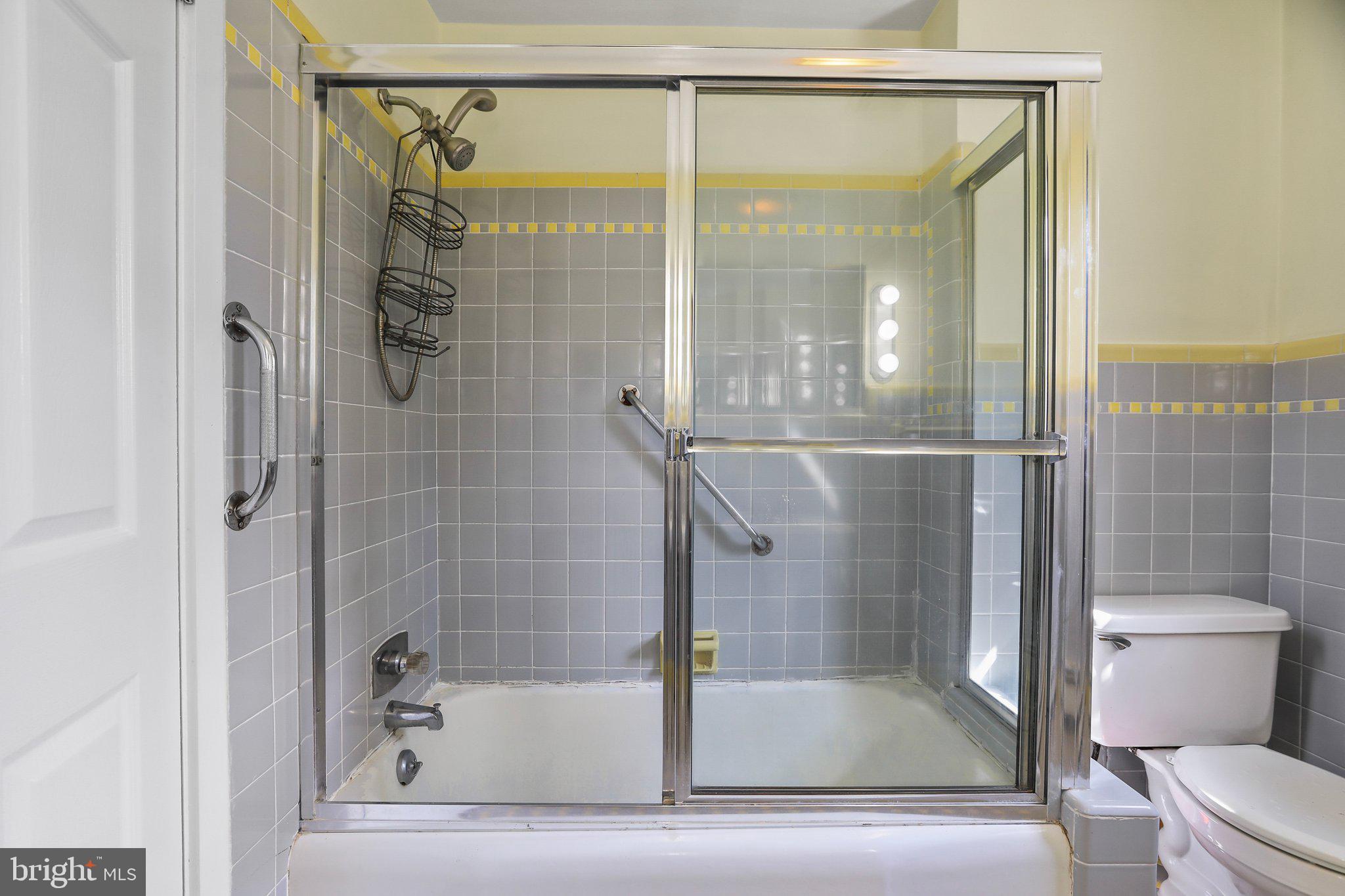 120 West Upper Ferry Road Ewing, NJ 08628 - Photo 21 of 27 a bathroom with a glass shower door