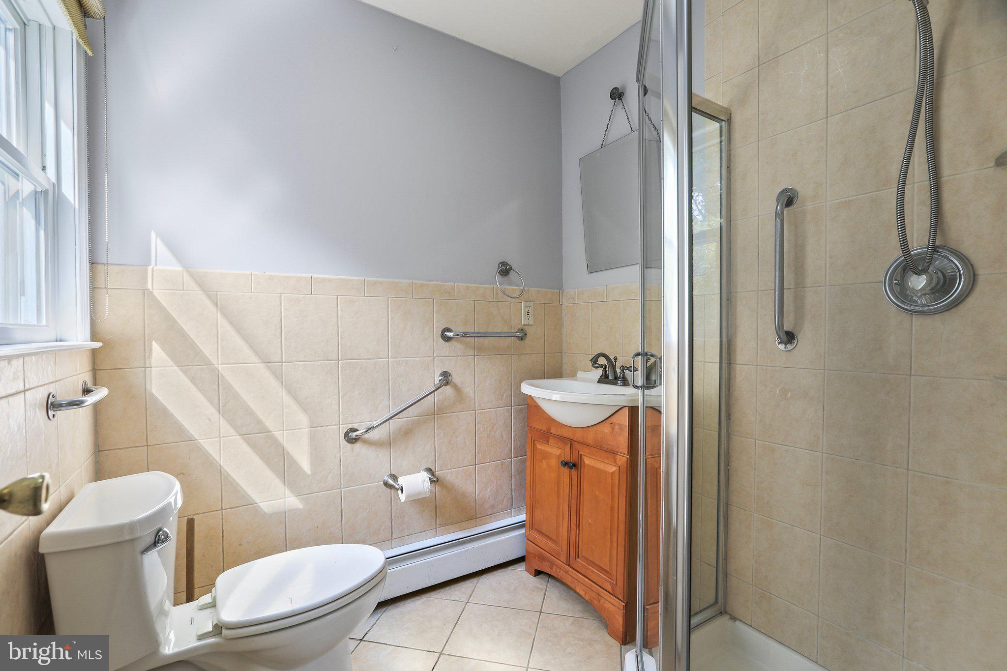 120 West Upper Ferry Road Ewing, NJ 08628 - Photo 22 of 27 a bathroom with a granite countertop sink toilet and shower
