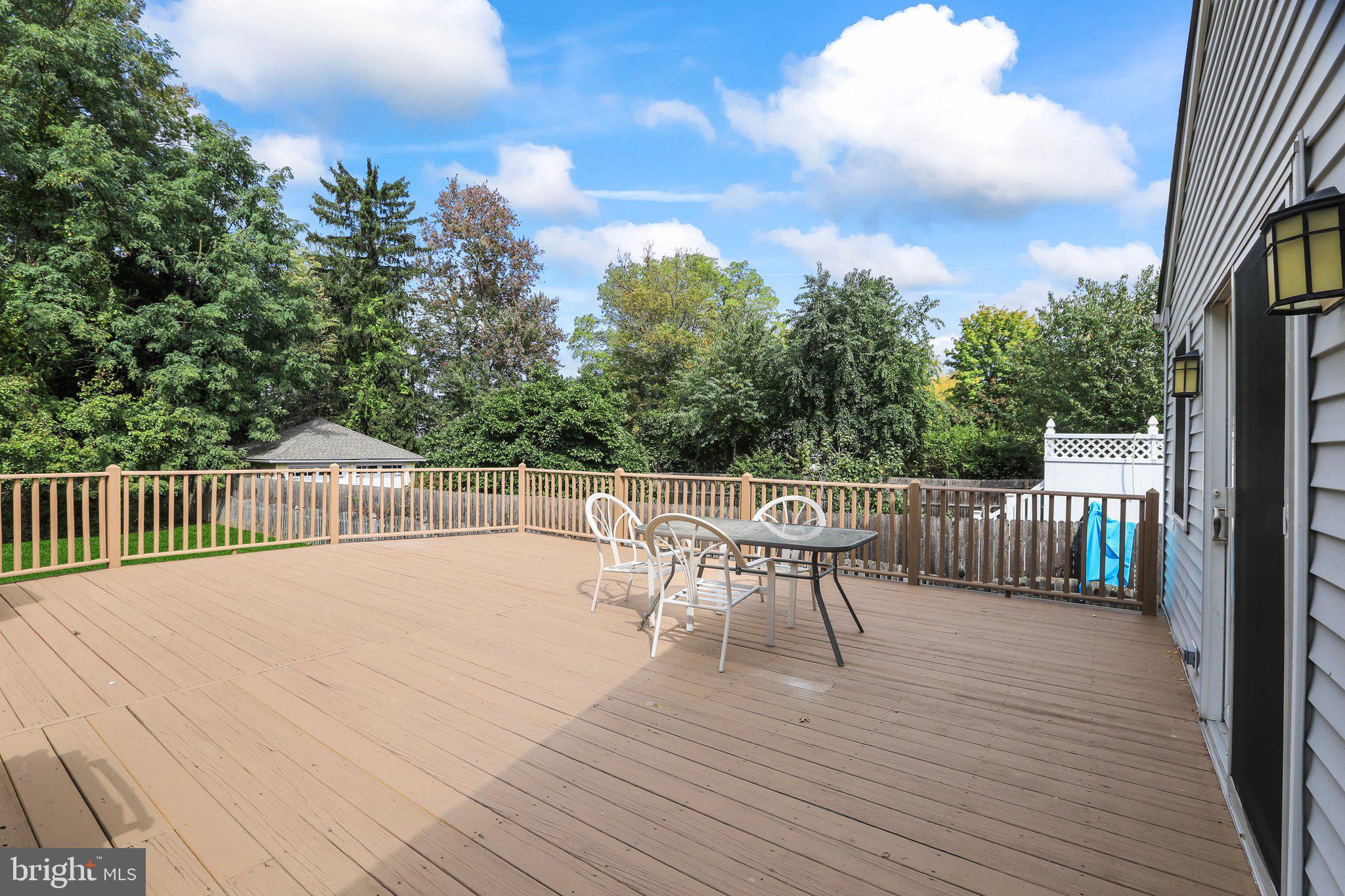 120 West Upper Ferry Road Ewing, NJ 08628 - Photo 26 of 27 a view of a chair and table on the wooden floor
