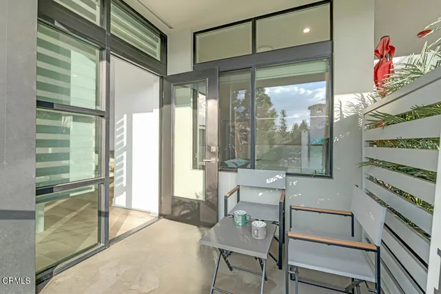 a room with table and chairs