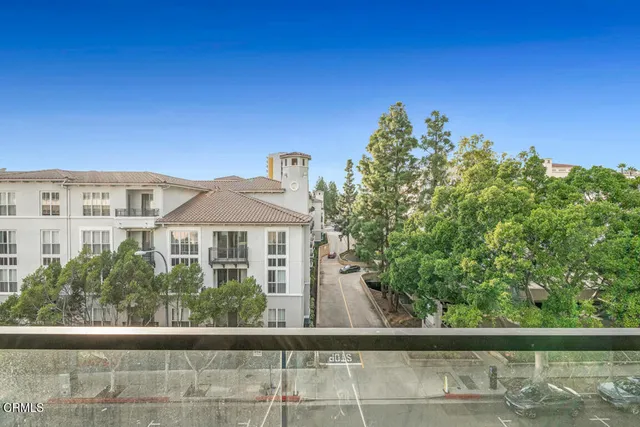 a view of a balcony with an outdoor space