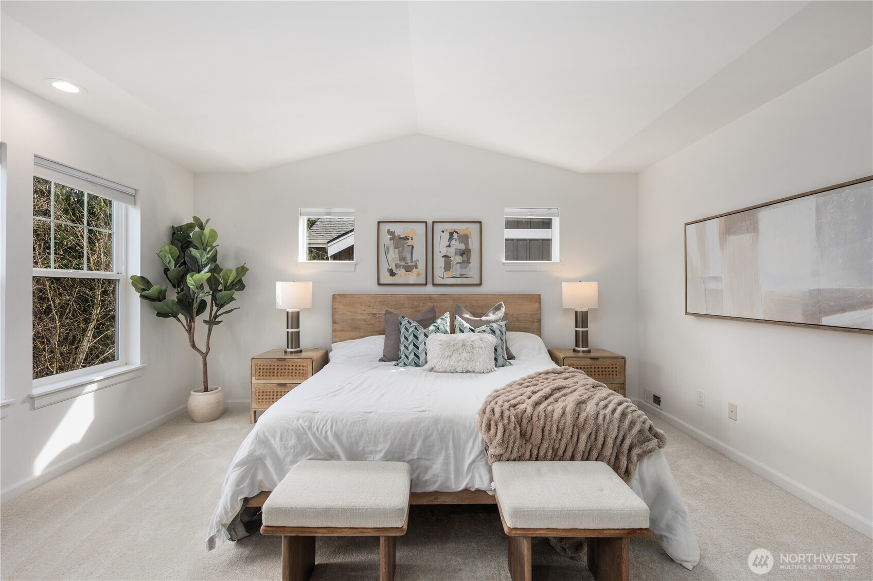 11127 Northeast 162nd Street Bothell, WA 98011 - Photo 20 of 40 a bedroom with a bed and a potted plant