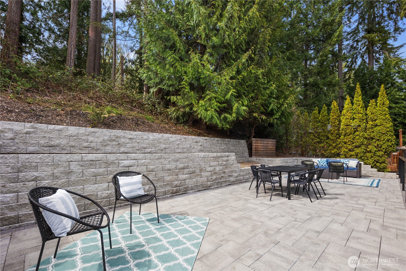 11127 Northeast 162nd Street Bothell, WA 98011 - Photo 35 of 40 a backyard of a house with outdoor seating