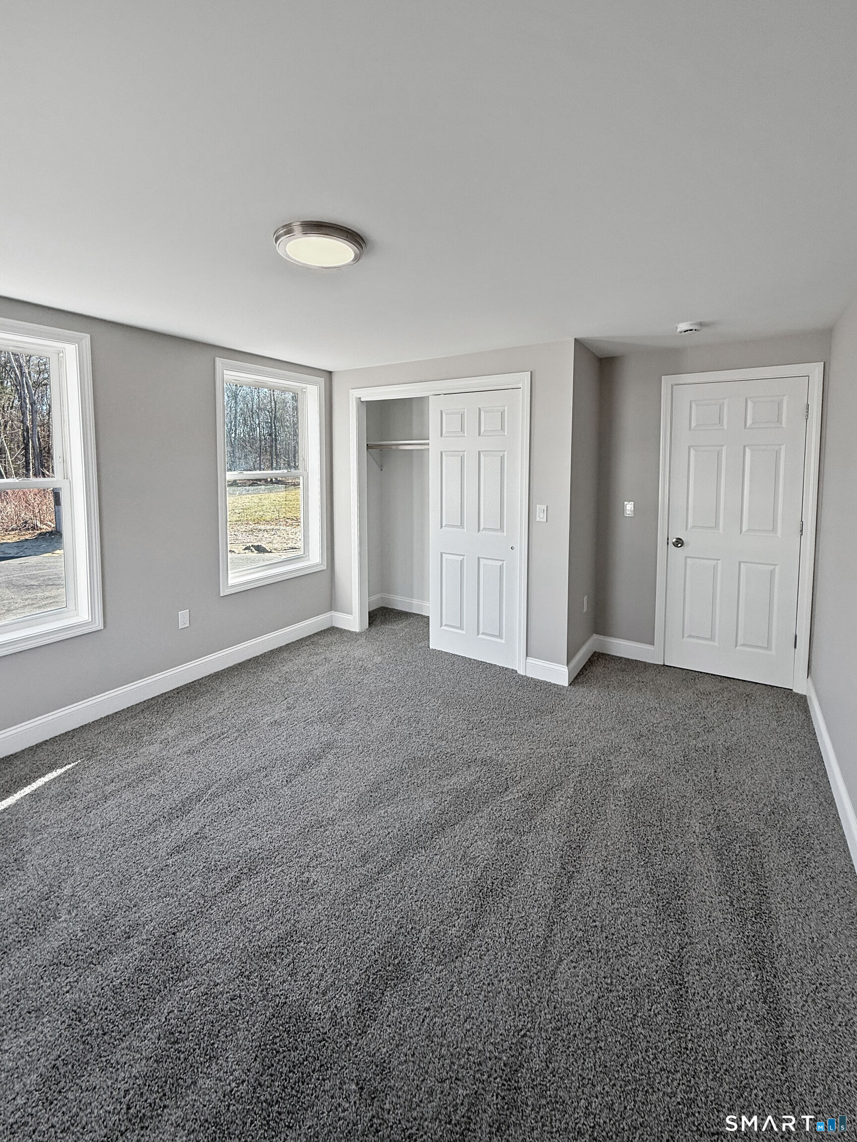 4 River Road, Unit 1 Lisbon, CT 06351 - Photo 11 of 16 a view of an empty room with windows