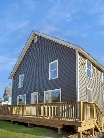 a backyard of a house with a yard and garage