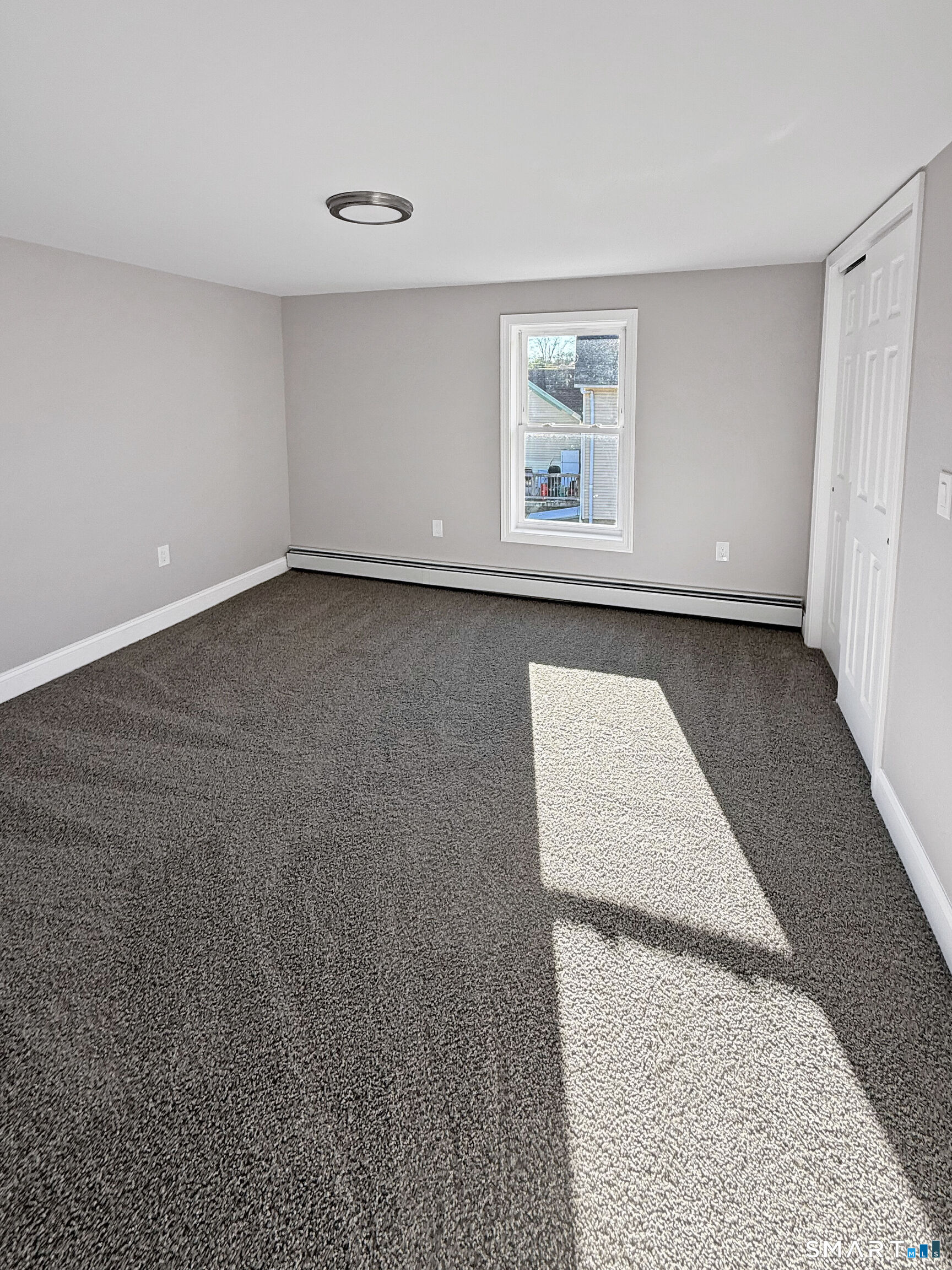 4 River Road, Unit 1 Lisbon, CT 06351 - Photo 4 of 16 an empty room with a window
