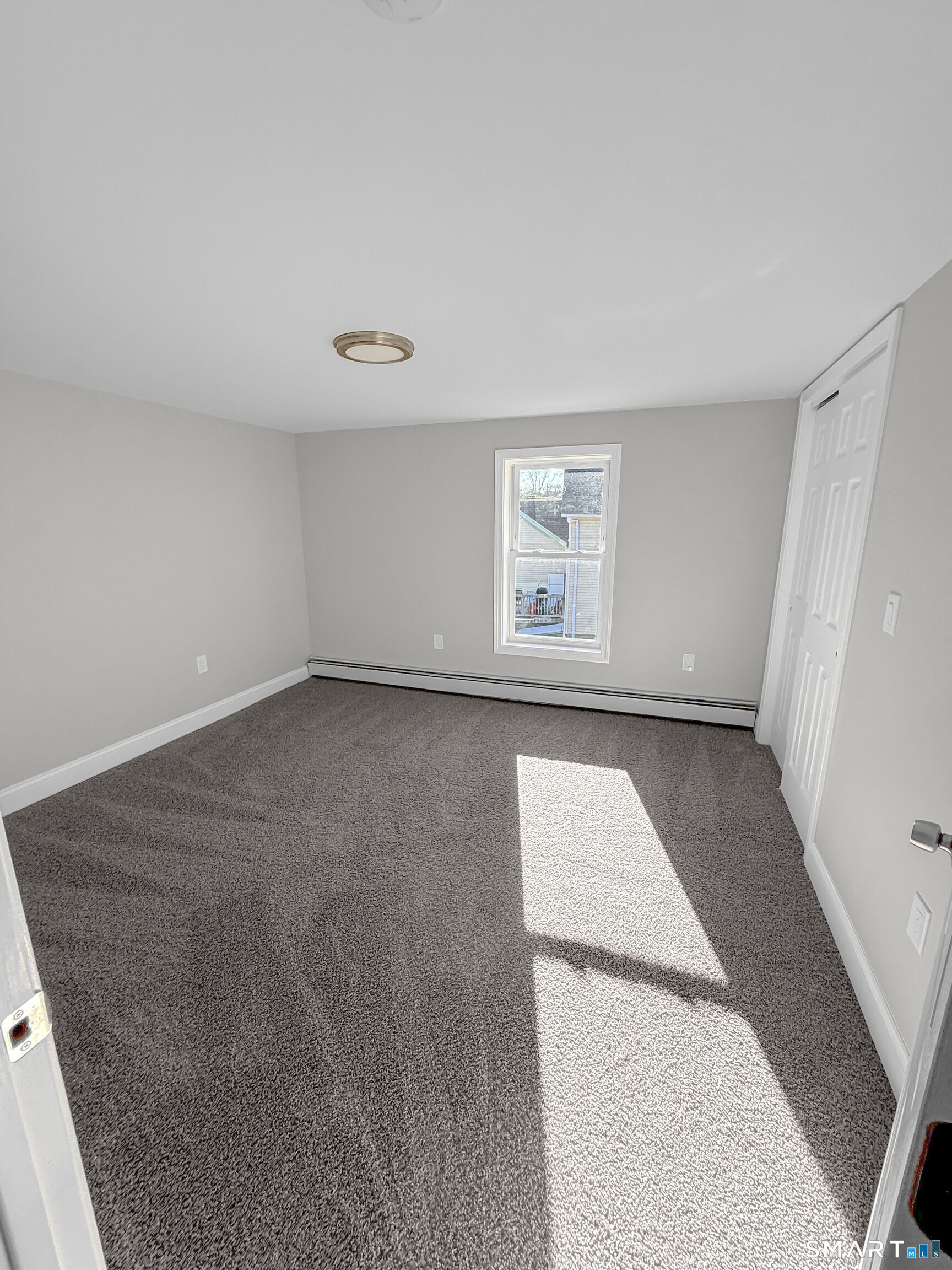 4 River Road, Unit 1 Lisbon, CT 06351 - Photo 5 of 16 an empty room with windows