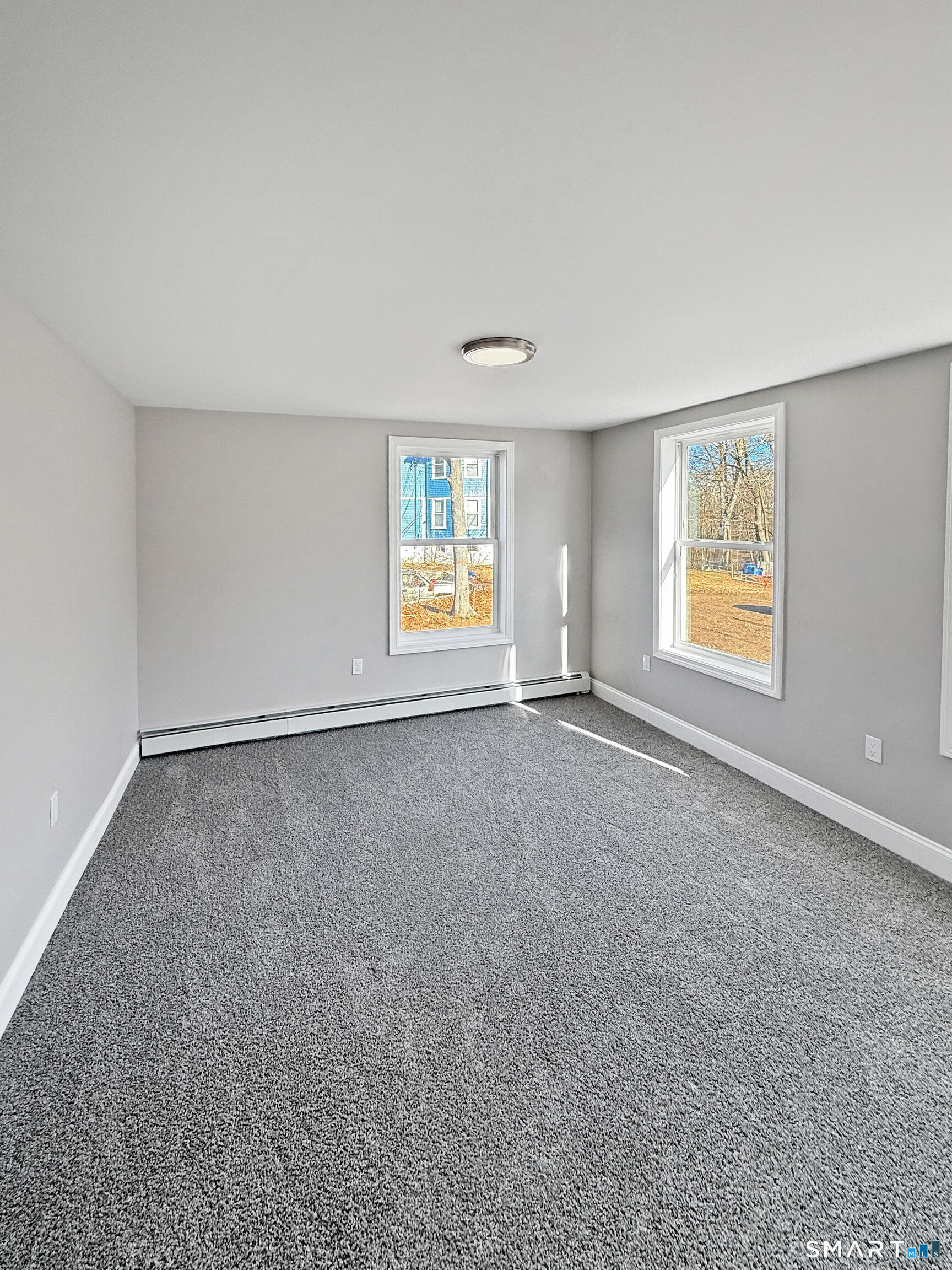 4 River Road, Unit 1 Lisbon, CT 06351 - Photo 7 of 16 an empty room with windows