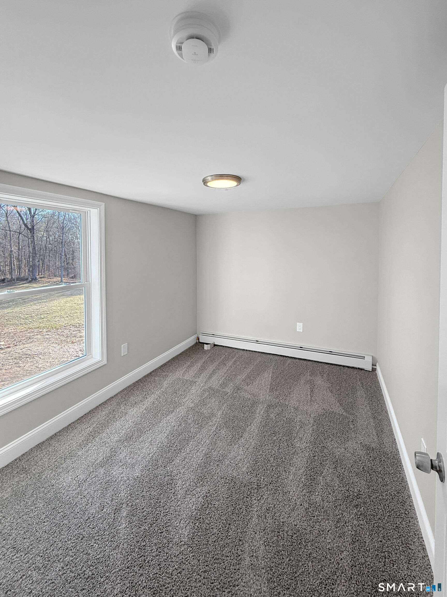 4 River Road, Unit 1 Lisbon, CT 06351 - Photo 9 of 16 an empty room with a window