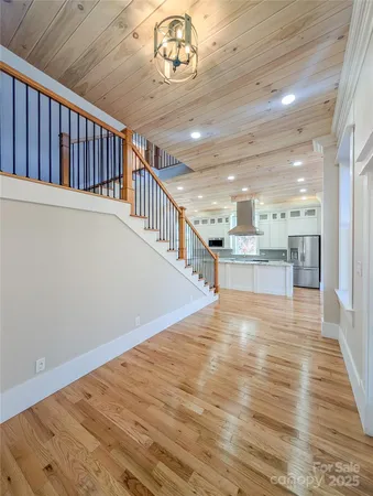 a view of an entryway with wooden floor