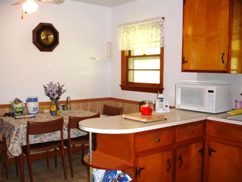 781 Roberson Mill Road Southeast Floyd, VA 24091 - Photo 7 of 7 a kitchen with a sink cabinets and window