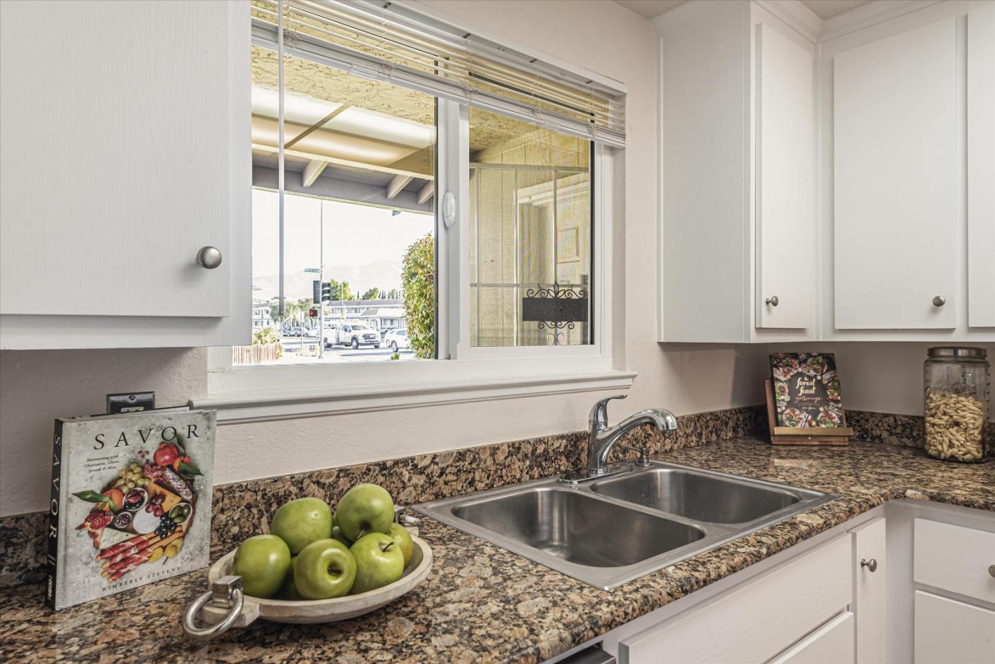 1726 Merrill Loop San Jose, CA 95124 - Photo 16 of 41 a kitchen with a stove a sink and a granite counter top