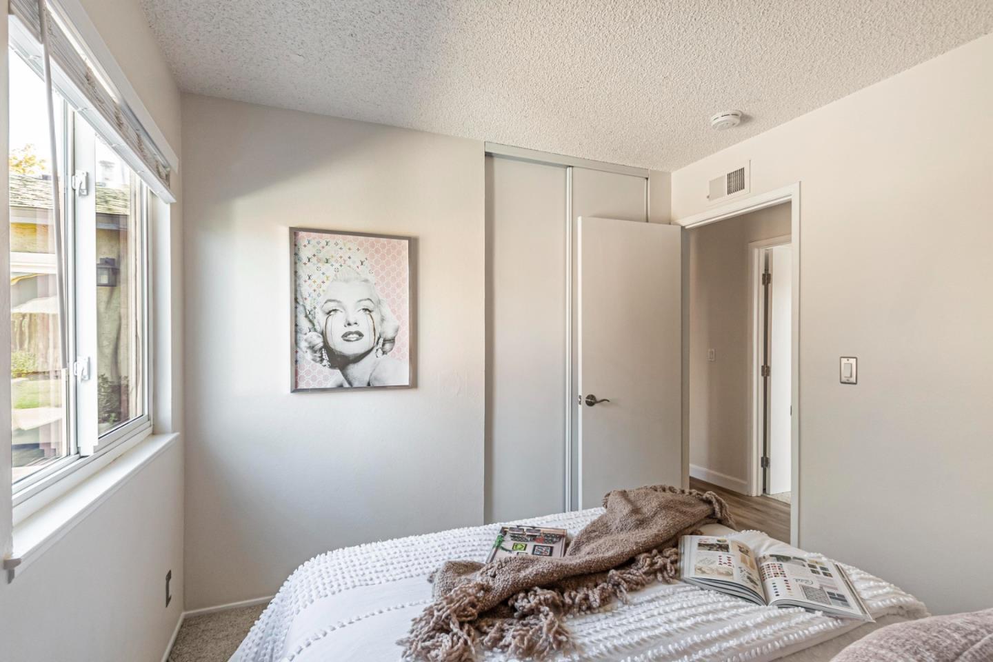 1726 Merrill Loop San Jose, CA 95124 - Photo 26 of 41 a bedroom with a bed and a window