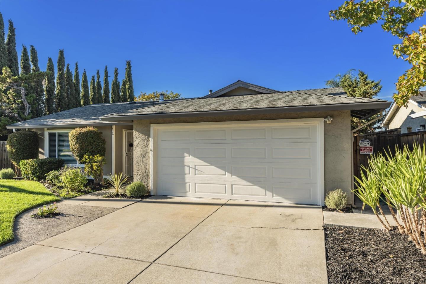 1726 Merrill Loop San Jose, CA 95124 - Photo 3 of 41 a front view of a house with a yard