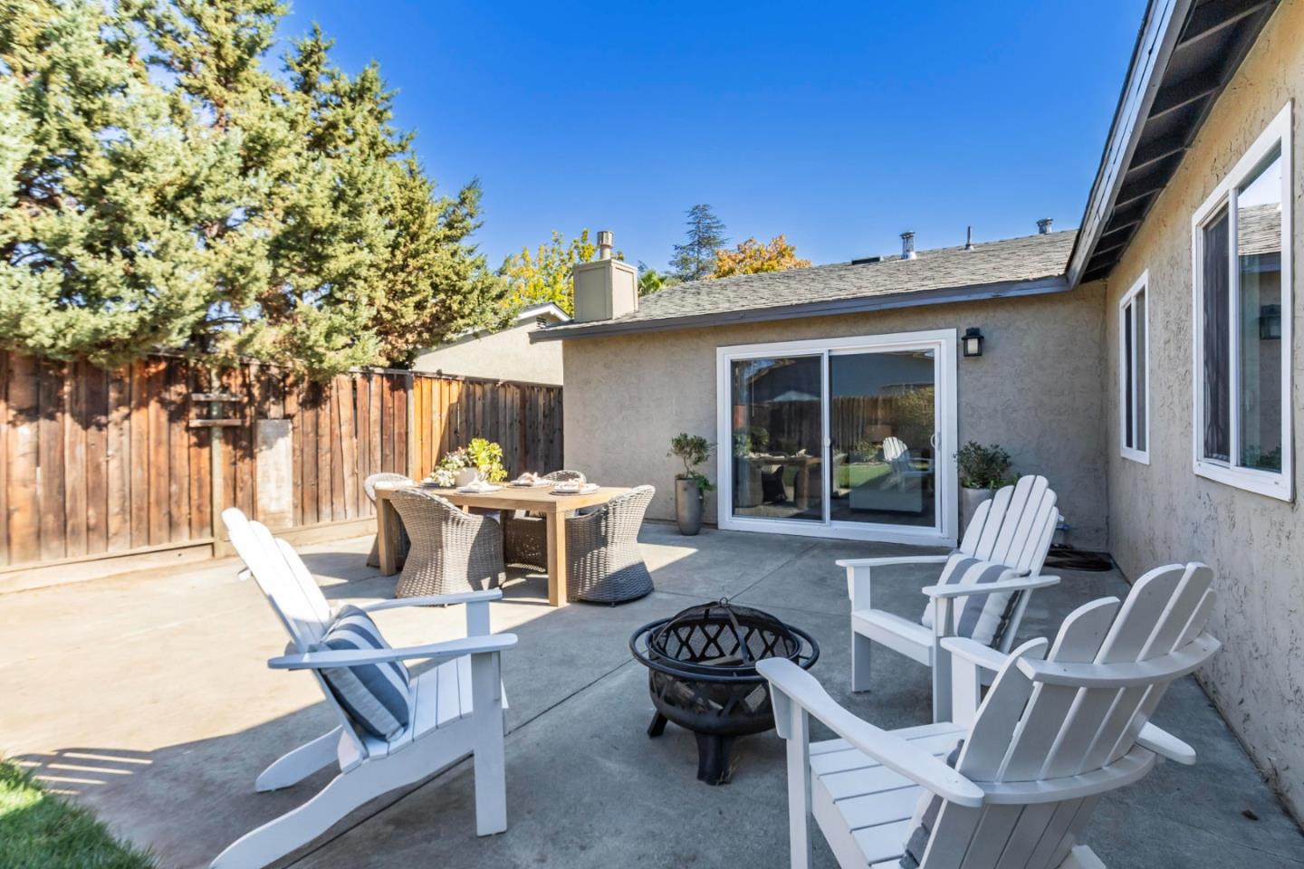 1726 Merrill Loop San Jose, CA 95124 - Photo 34 of 41 a view of a patio with table and chairs and potted plants