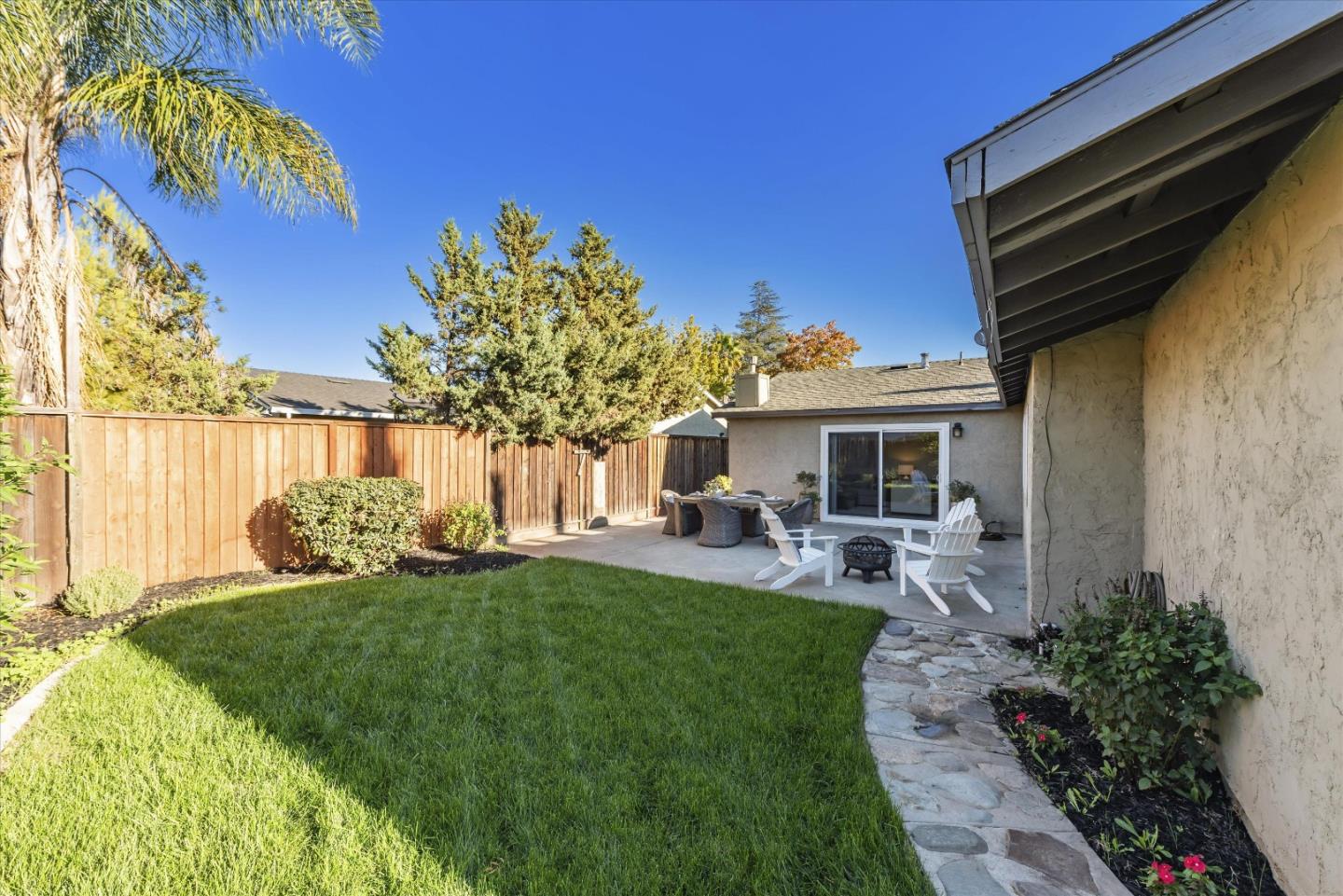 1726 Merrill Loop San Jose, CA 95124 - Photo 37 of 41 a view of a house with backyard sitting area and garden
