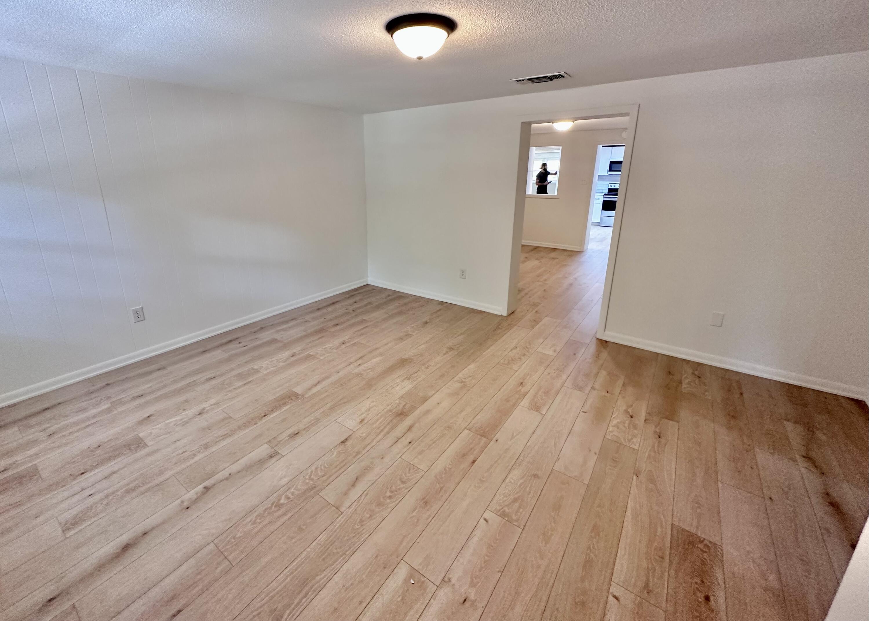 159 Smith Street Crestview, FL 32539 - Photo 18 of 29 wooden floor in an empty room