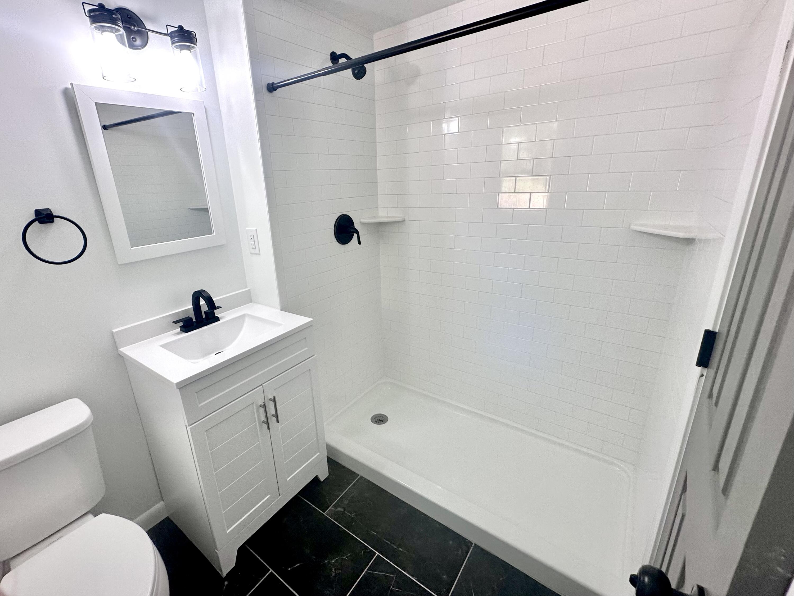 159 Smith Street Crestview, FL 32539 - Photo 22 of 29 a bathroom with a sink toilet and shower