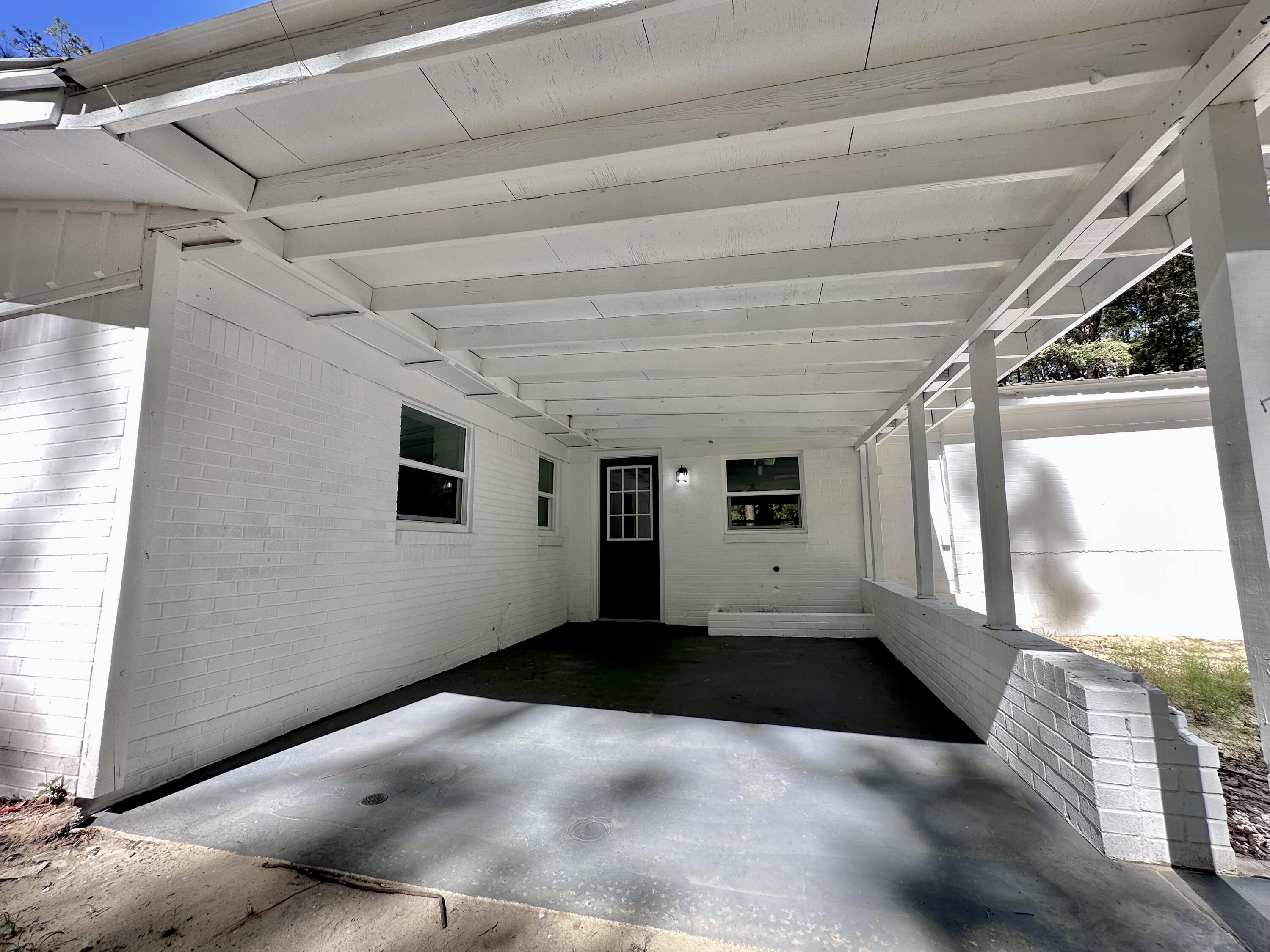 159 Smith Street Crestview, FL 32539 - Photo 23 of 29 a view of a porch