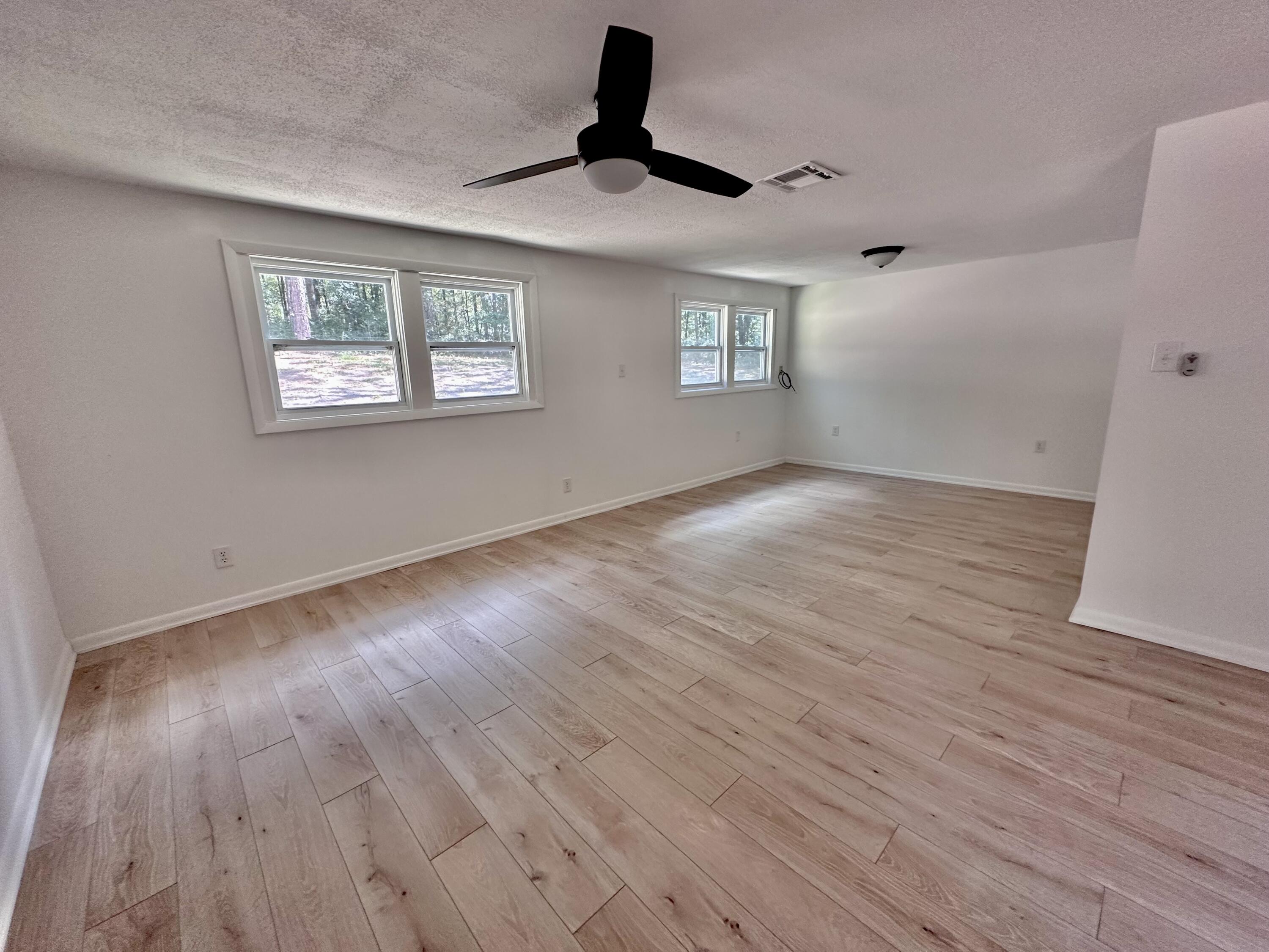 159 Smith Street Crestview, FL 32539 - Photo 9 of 29 a view of an empty room and window