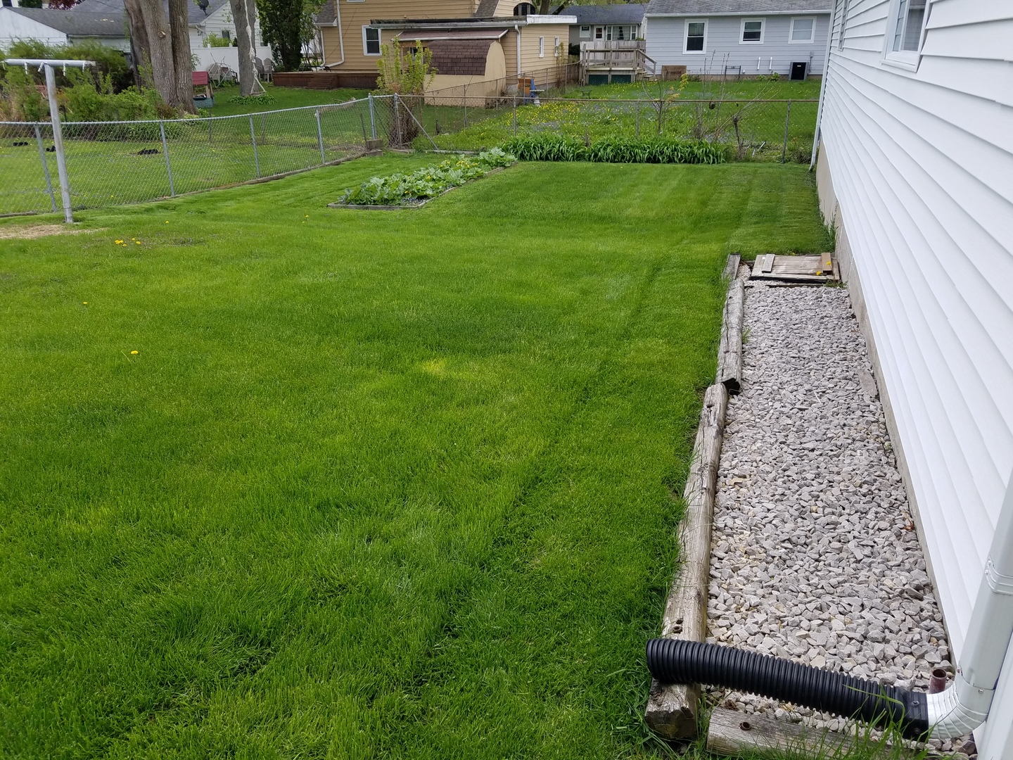 950 North 12th Street Rochelle, IL 61068 - Photo 13 of 18 a view of a backyard with a garden