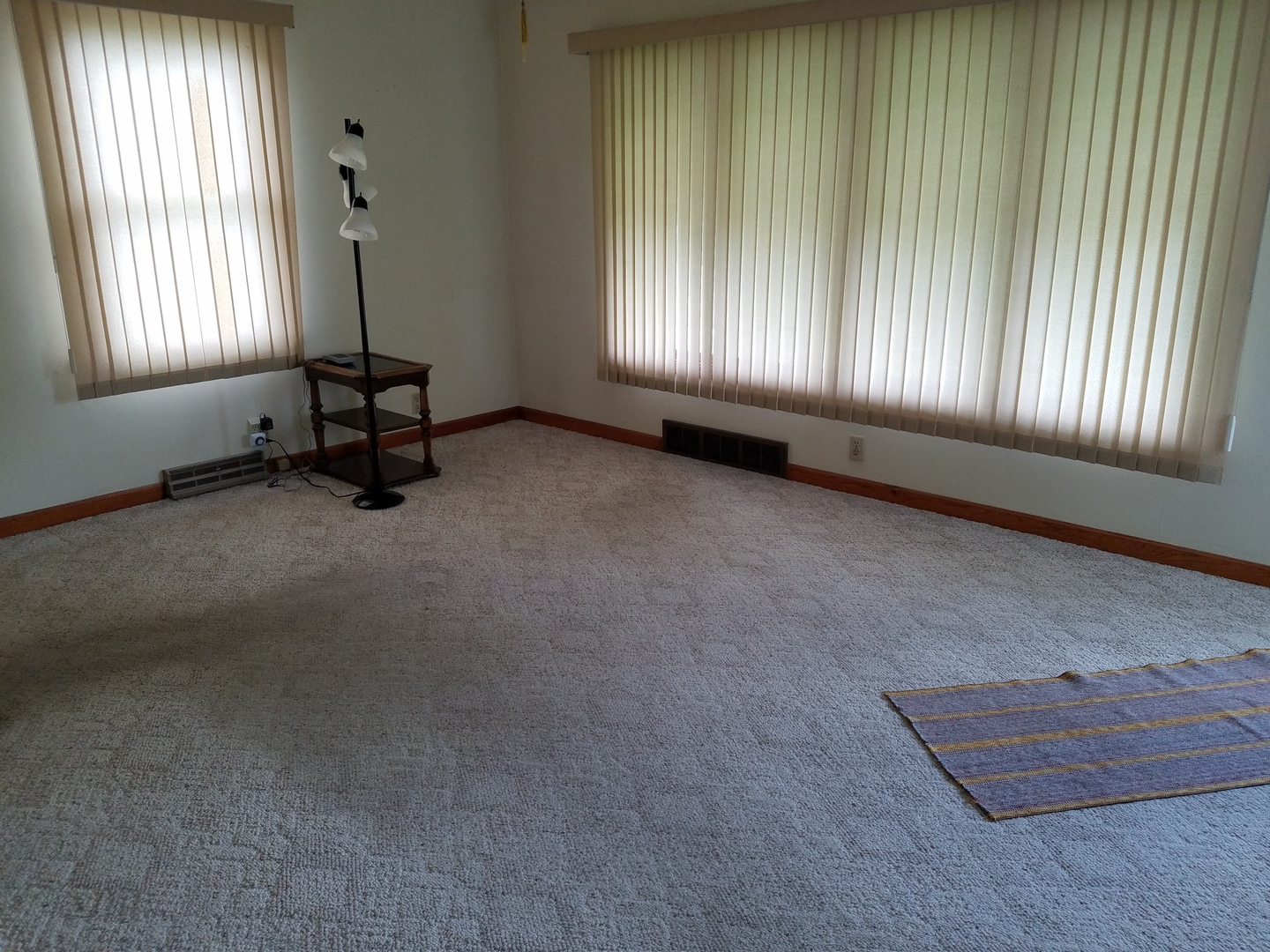 950 North 12th Street Rochelle, IL 61068 - Photo 5 of 18 an empty room with windows