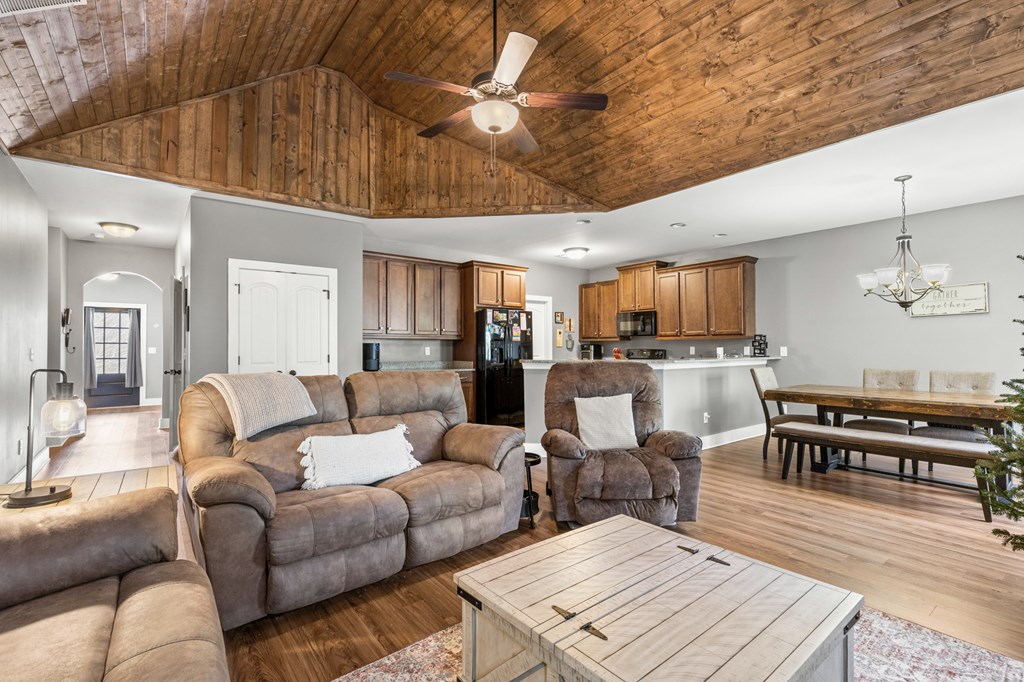 41 Brumby Trail Ellijay, GA 30536 - Photo 18 of 39 a living room with furniture kitchen view and a wooden floor