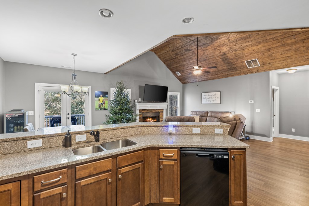 41 Brumby Trail Ellijay, GA 30536 - Photo 20 of 39 a kitchen with stainless steel appliances granite countertop a sink and a microwave