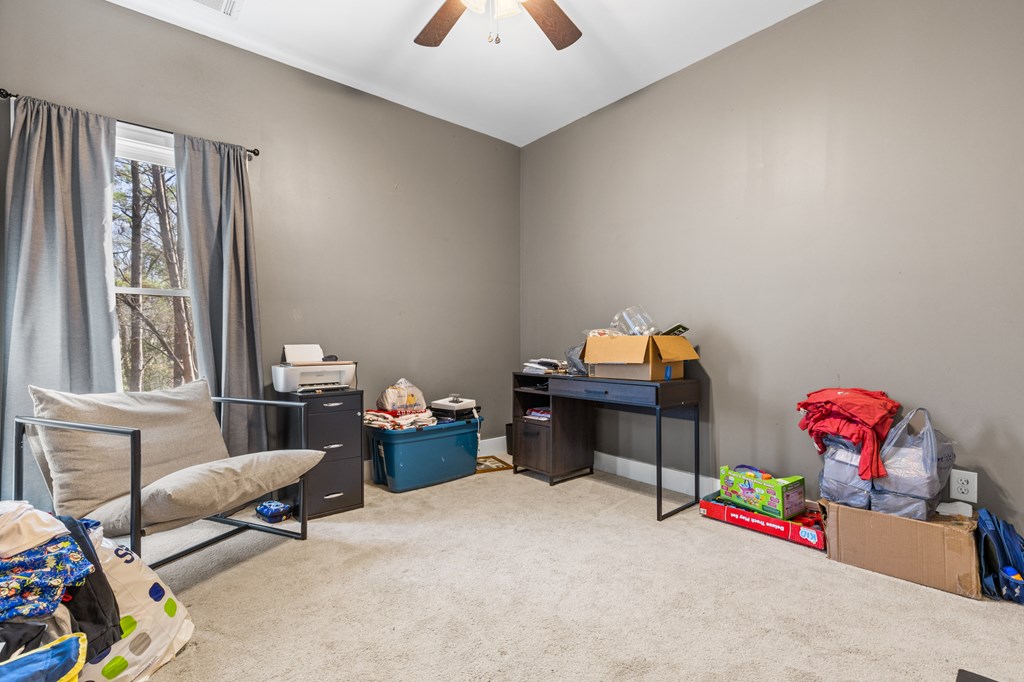 41 Brumby Trail Ellijay, GA 30536 - Photo 25 of 39 a living room with furniture and a window