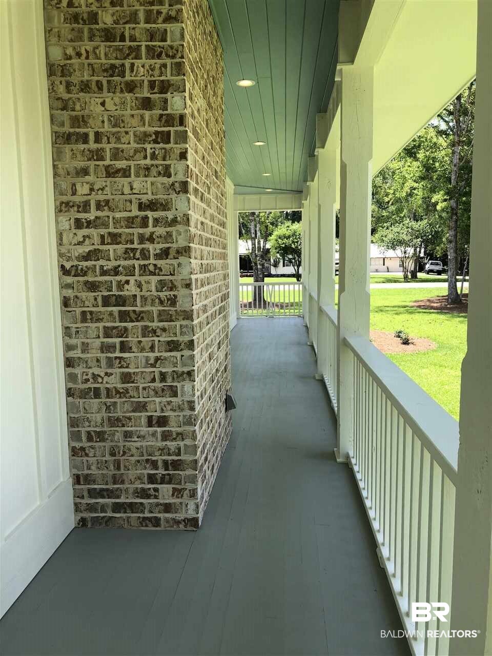 5598 Millhouse Road Gulf Shores, AL 36542 - Photo 15 of 29 Side porch