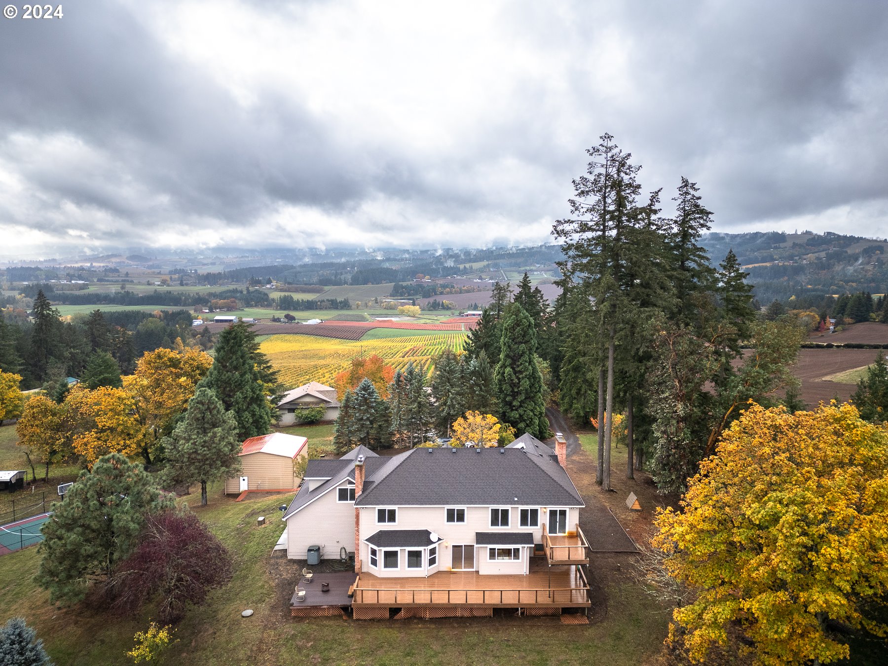 33495 Southwest Riedweg Road Cornelius, OR 97113 - Photo 45 of 48 a view of a house with a yard and sitting area