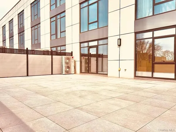 a view of empty room with windows