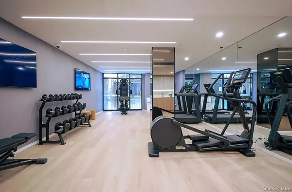 a view of a room with gym equipment