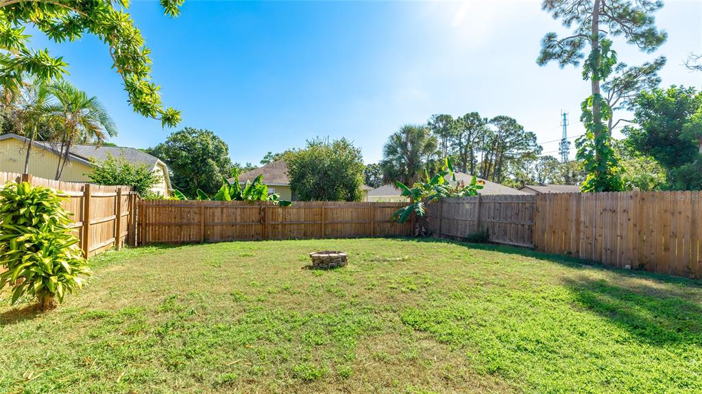 4537 South Lockwood Ridge Road Sarasota, FL 34231 - Photo 21 of 22 a swimming pool with wooden fence