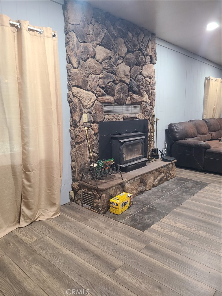 141 Rutherford Lane Oroville, CA 95966 - Photo 8 of 9 a bedroom with a bed and a couch