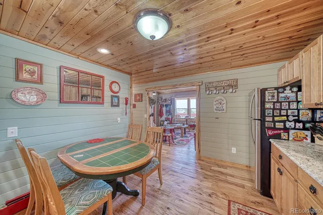 a bathroom with a sink mirror vanity and toilet