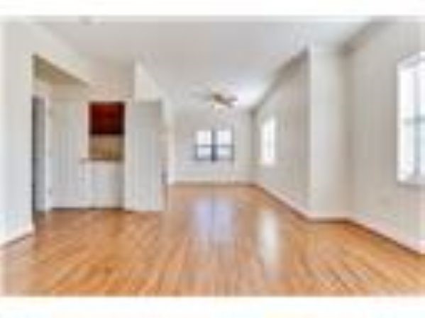 10102 Neuens Road, Unit A302 Houston, TX 77080 - Photo 3 of 8 a view of an empty room and window