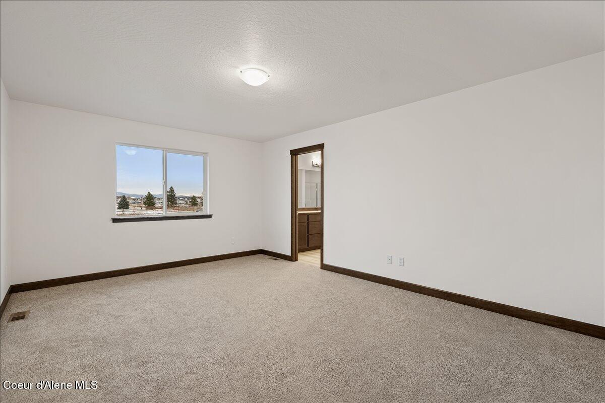 2902 North Neptune Street Post Falls, ID 83854 - Photo 20 of 37 Primary bedroom