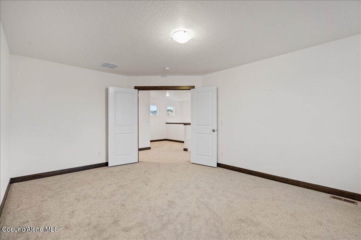 2902 North Neptune Street Post Falls, ID 83854 - Photo 21 of 37 Primary bedroom