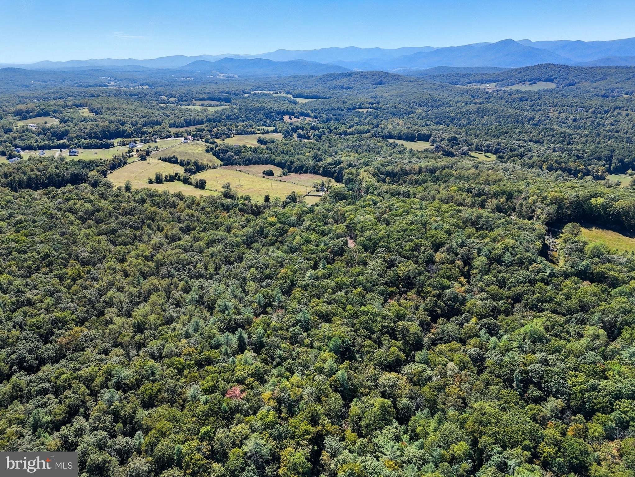 Lot 7 Obannons Mill Road Boston, VA 22713 - Photo 8 of 14 an aerial view of a houses with a lush green hillside