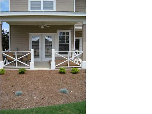 29 South Sand Palm Road, Unit 24 Freeport, FL 32439 - Photo 12 of 17 a view of house with wooden floor and a potted plant