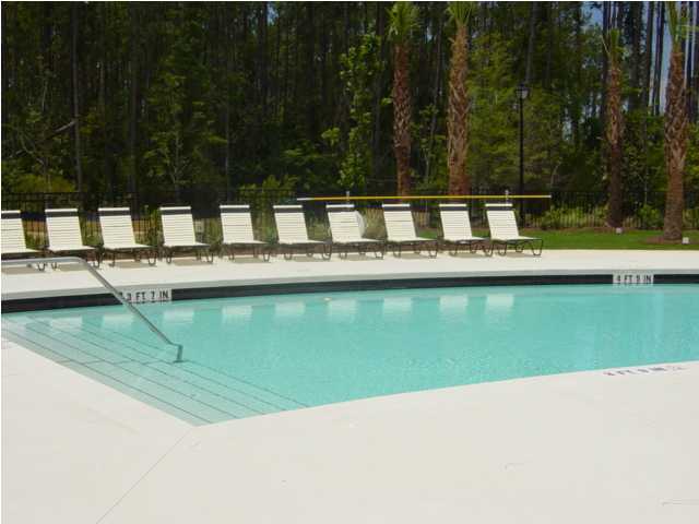 29 South Sand Palm Road, Unit 24 Freeport, FL 32439 - Photo 13 of 17 a view of a swimming pool with a garden