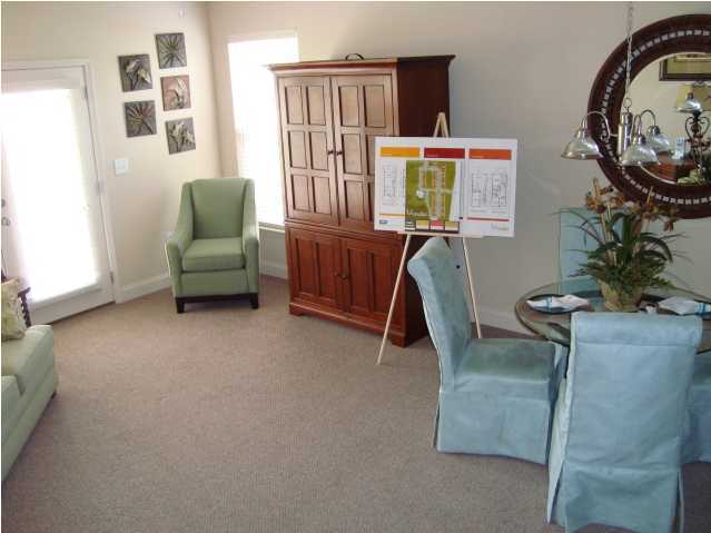 29 South Sand Palm Road, Unit 24 Freeport, FL 32439 - Photo 3 of 17 a living room with furniture and a window
