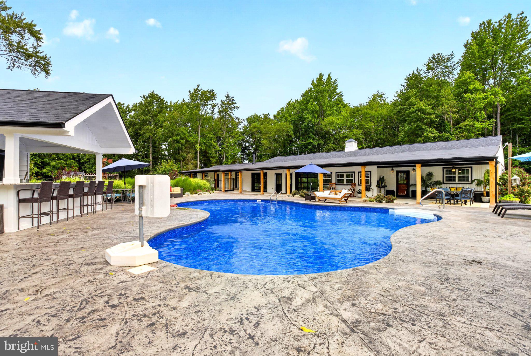 57 Island Road Monroeville, NJ 08343 - Photo 50 of 82 Serene retreat with a sparkling pool.