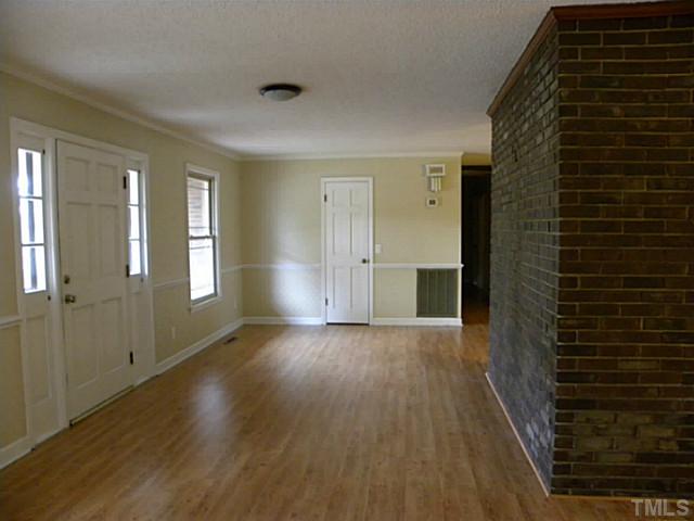 750 Greenleaf Road Angier, NC 27501 - Photo 3 of 10 wooden floor in an empty room