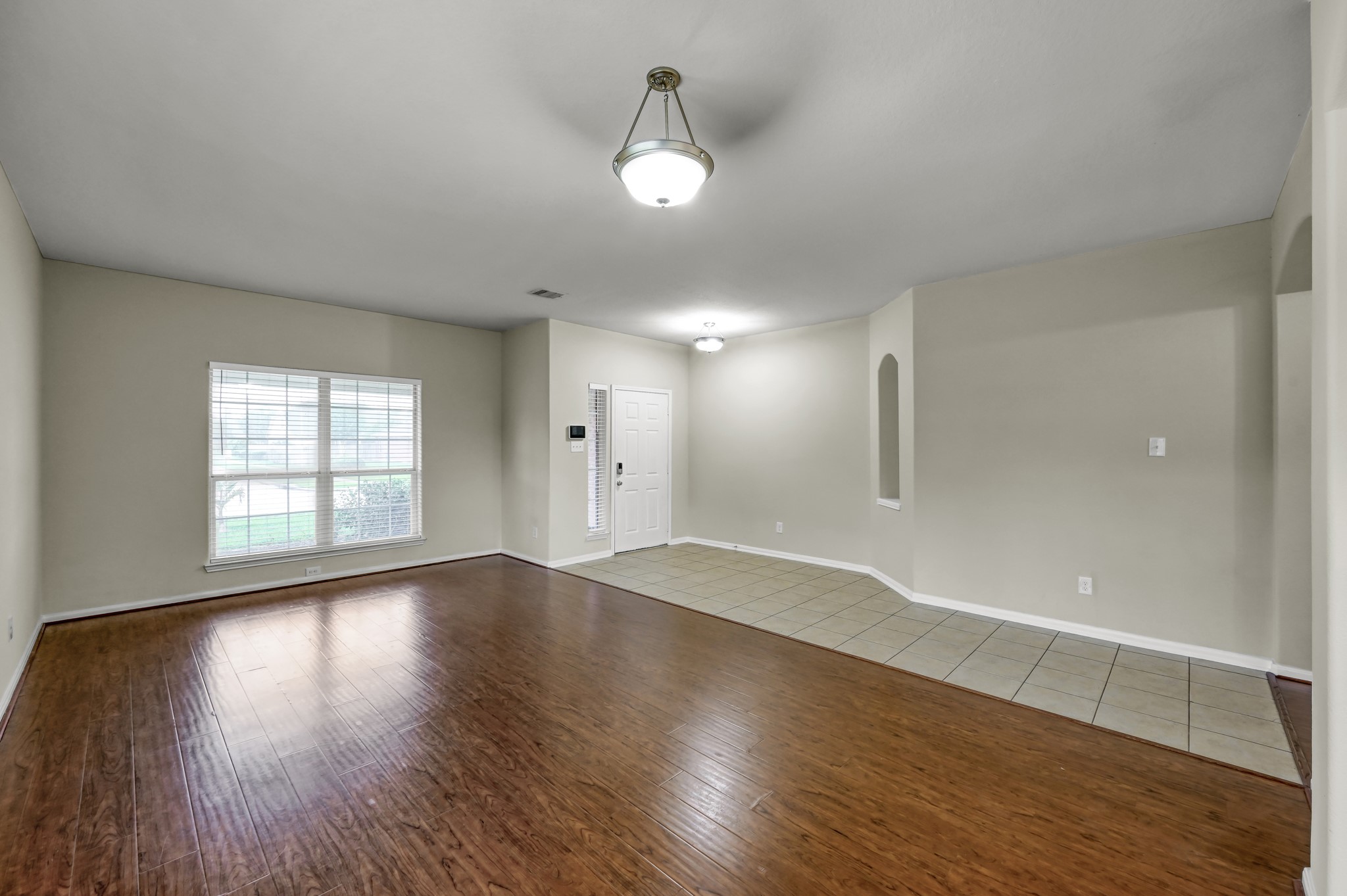 631 Timberstand Lane Spring, TX 77373 - Photo 38 of 38 This thoughtfully designed floor plan offers seamless flow between the entry, den, dining, and main living spaces with no carpet throughout.
