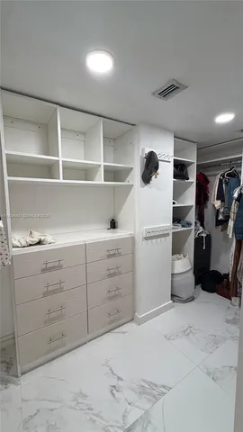 a view of a walk in closet