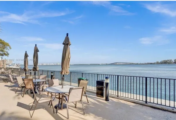 a view of a terrace with furniture